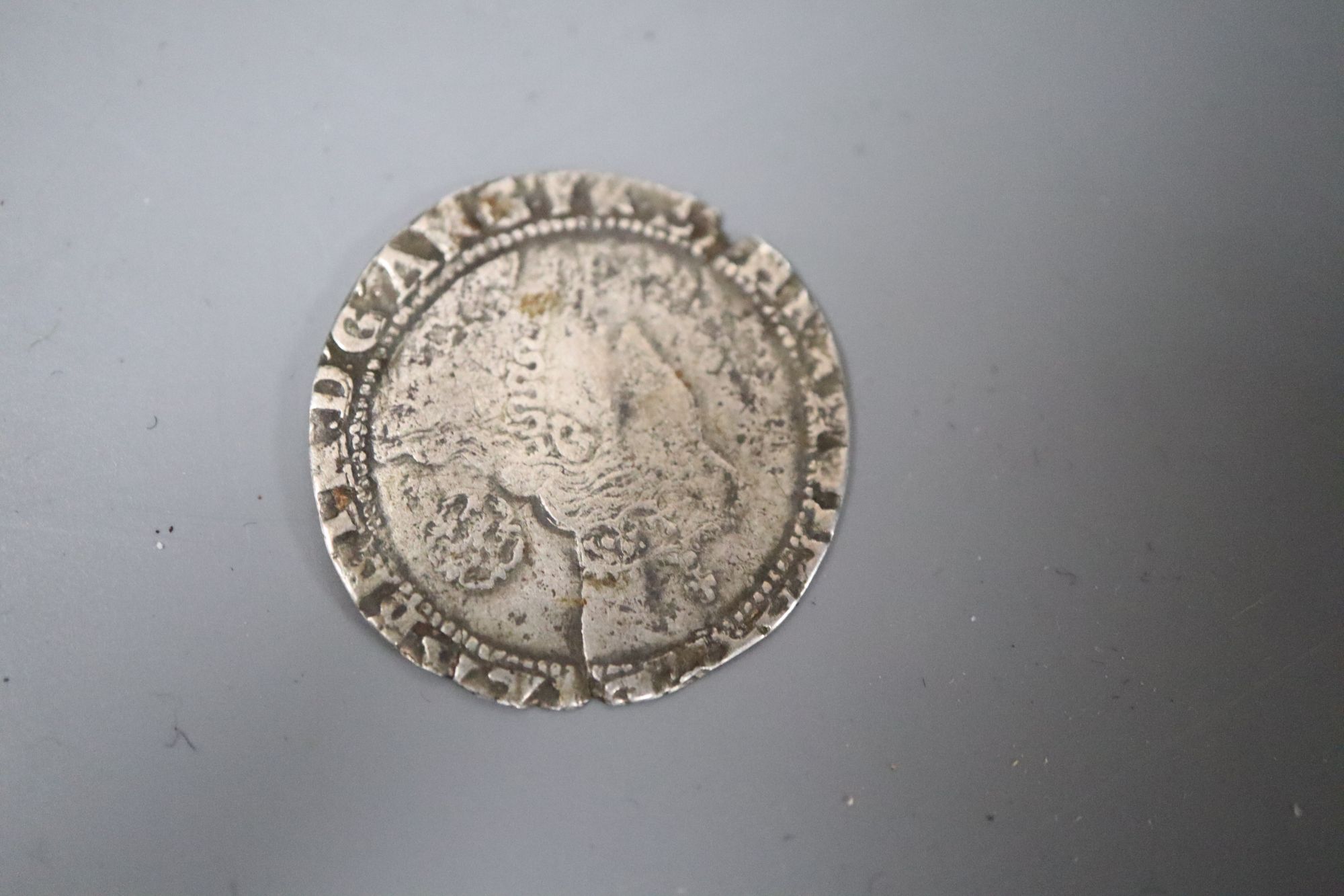 An Elizabeth I 1578 silver sixpence, 4th issue, splits and off centre otherwise F